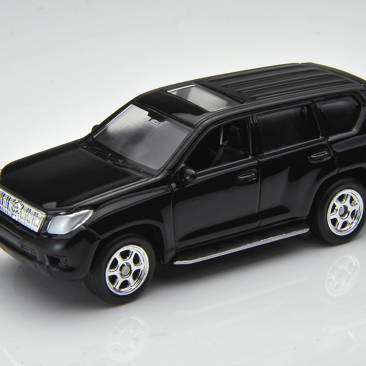 Auto Toyota Land Cruiser Prado - Welly Escala 1:60